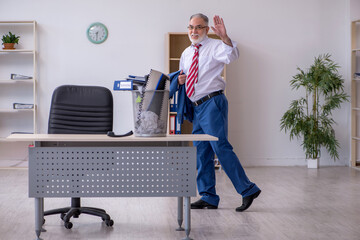 Old businessman employee rejecting new ideas with lots of papers