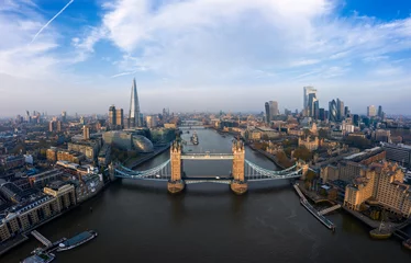 Selbstklebende Fototapeten Aerial view of the Tower Bridge in London. One of London's most famous bridges and must-see landmarks in London. Beautiful panorama of London Tower Bridge. © NEWTRAVELDREAMS
