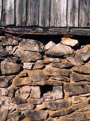 old stone barn in the village in spring
