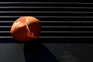 Chicken egg shell isolated on dark background.