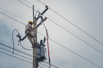 Lineman climb concrete pole and use clamp stick grip all types to connect the single phase...