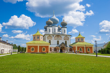 Fototapeta na wymiar View of the ancient Uspensky Cathedral on a sunny July day. Tikhvin Bogorodichny Uspensky Monastery. Tikhvin, Russia