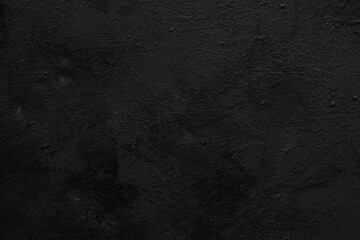 Dark grunge black slate background or texture.