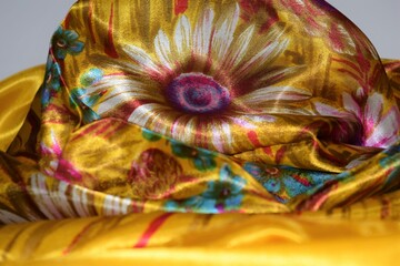 yellow shawl, scarf with eye pattern