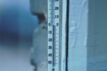 on a street thermometer about zero degrees