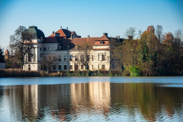 Fototapeta na wymiar Ruegers Castle with its splendit Baroque structure. Ruegers Castle (German: Schloss Ruegers) is nestled in a pond landscape near the Czech border. 
