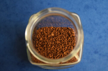 Coffee in a bowl on the blue background