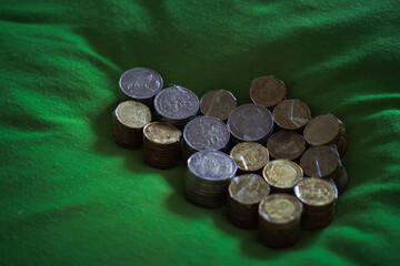 Coins of Malaysia. Financial Planning concept .The coins are arranged in value. Wrapped with clear tape for easy exchange at the shop. © ellinnur