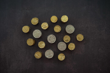 Coins of Malaysia. Financial Planning concept .The coins are arranged in value. Wrapped with clear tape for easy exchange at the shop. © ellinnur