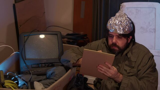 crazy guy writing manifesto