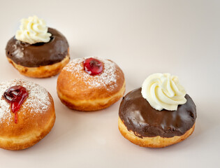 Close up of fresh donuts  for Hanukkah celebration. Selective focus.