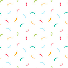 Vector seamless pattern background with bright colorful confetti, sprinkles.
