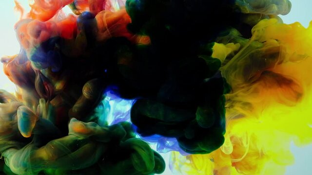 4K Footage,Color splash background, Color paint drops in water , Luxury colors Slow motion shot,