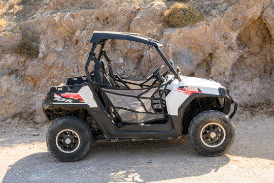 Santorini, Greece - September 16, 2020: Buggy car parked on the street on Sanotrini island