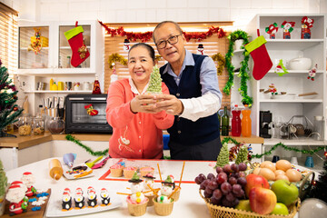 Thanksgiving or christmas Celebration Asian  Family Dinner Concept.Grandparents having holiday dinner.Happy family cooking for party. father mother having dinner at home.