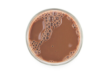 Chocolate milk puddle in glass isolated on white background.