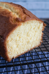 Lemon yogurt cake on rustic background