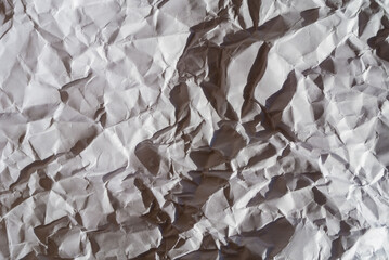 white crumpled paper texture background.