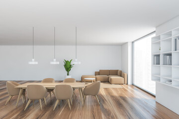 Wooden hall with brown chairs and sofa and wooden table and big window
