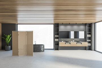 Wooden bathroom with bathtub and sinks near window, black panel wooden screen