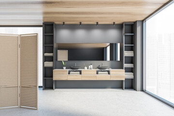 Wooden bathroom with two sinks near window, panel wooden screen