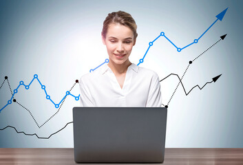 Woman with laptop and growing graph