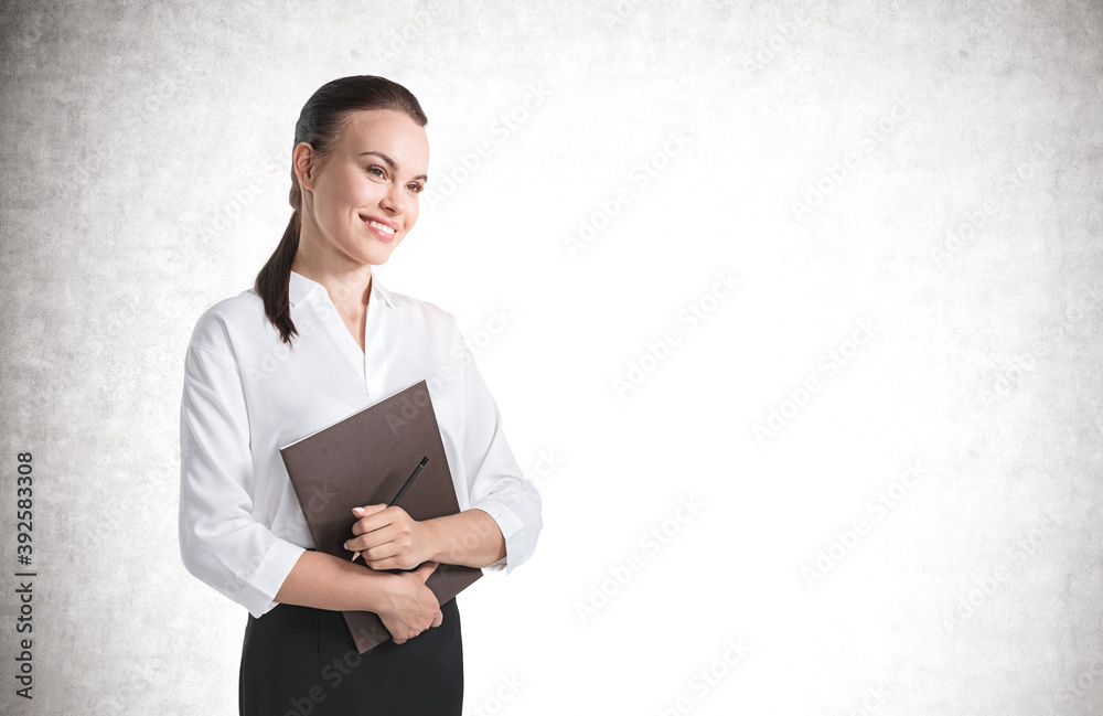 Wall mural Young businesswoman with folder, mock up