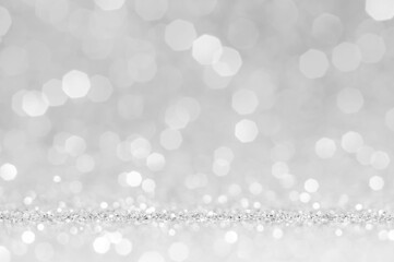 Light grey,white bokeh,circle abstract light background,grey,white shining lights, sparkling glittering Valentines day,women day or event lights romantic backdrop.Blurred abstract holiday background..