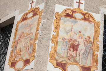 Fresco from the St. Magdalena little church in Val di Funes representing a moment on the Way of the cross: 10th and 11th Station