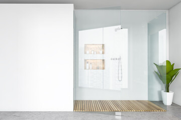 Mockup copy space and transparent shower cabin in white open space bathroom
