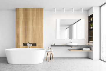 Bathroom in white and wooden design with row of bathtub, sink and mirror