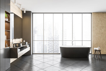 Dark grey bathroom with black bathtub and sinks with big mirror, tile floor
