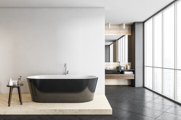 Dark grey bathroom with bathtub and sinks on background, grey floor