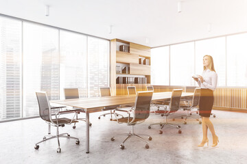 Woman in white meeting room