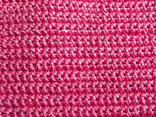 Crochet with red threads of medium thickness