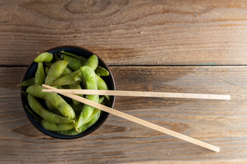 Edamame green soy beans in a bowl.