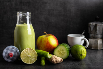 Detox smoothie with ginger, cucumber, apple and lemon.