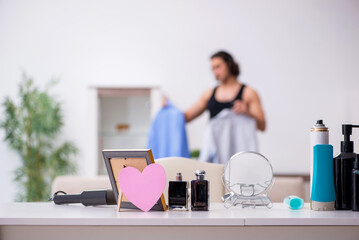 Young handsome man preparing for date
