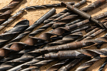 old vintage hand tools - set of drills on a wooden background