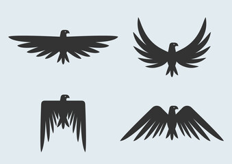 Set of eagle silhouettes. Vector eagles logo.