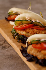 Steamed wheat bun dressed with designer sauce. Vietnamese cuisine concept. Still life. Close-up.