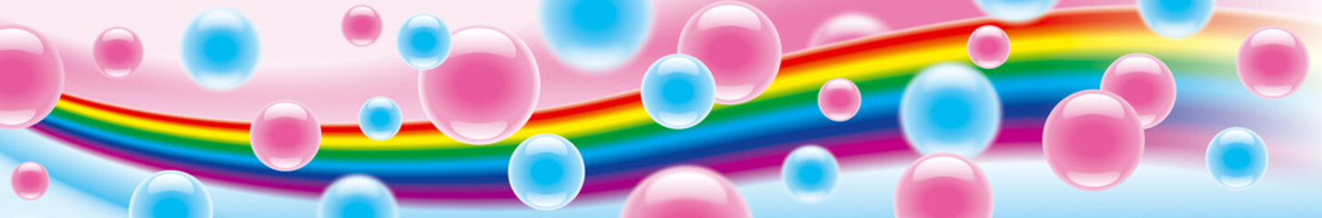 Pink and blue bubbles on a rainbow background.