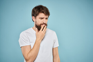 Bearded man emotions white t-shirt lifestyle gestures with hands blue backgrounds