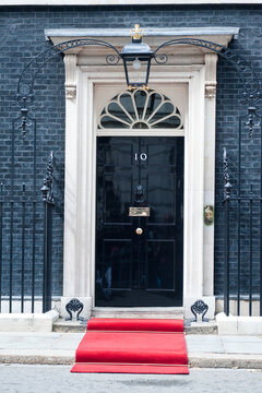 London, UK - 16 June 2013: 10 Downing Street entrance door, the residence of the British Prime Minister. Vertical shot.