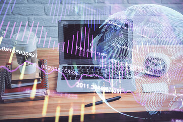 Double exposure of forex graph and work space with computer. Concept of international online trading.