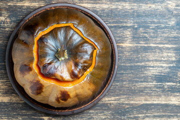 Stuffed roasted pumpkin, whole baked, filled with a mixture of rice, raisins and spices