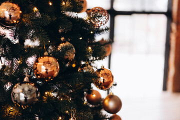 christmas decorations, balls on a christmas tree, christmas background with bokeh, selective focus