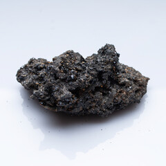 Natural mineral pyrrhotite on a white background
