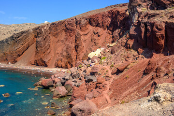 Santorini, Greece - September 16, 2020: The Red Beach on Santorini Island - one of the most scenic beaches on the world. Cyclades, Greece