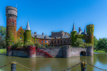 Public castle in torhout "kasteel wynendaele" .  The beauty of belgium, flanders postcard.  Castle overwhelmed by nature and water in his greatness.  Authentic buildings like postcard